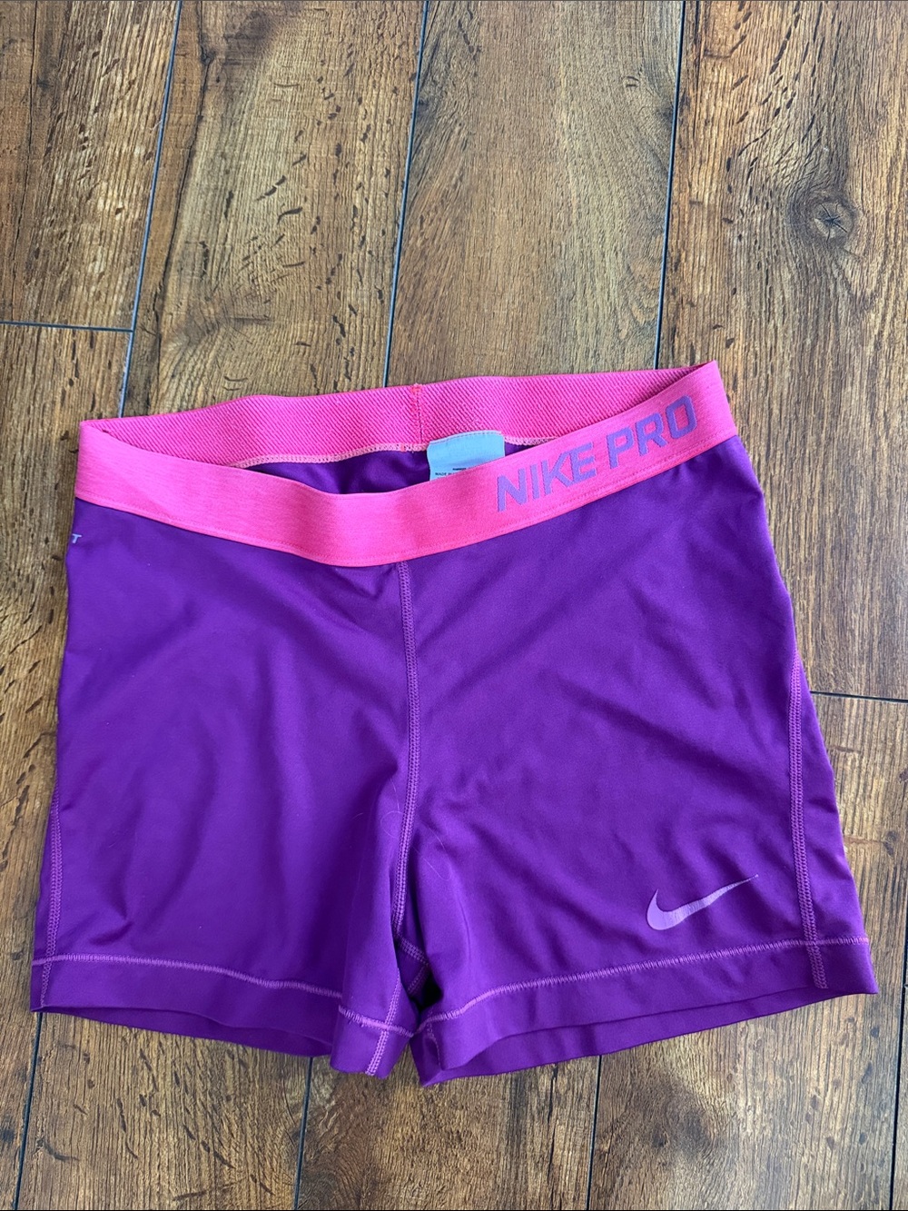 Nike Women's Purple Athletic Shorts with Pink Waistband